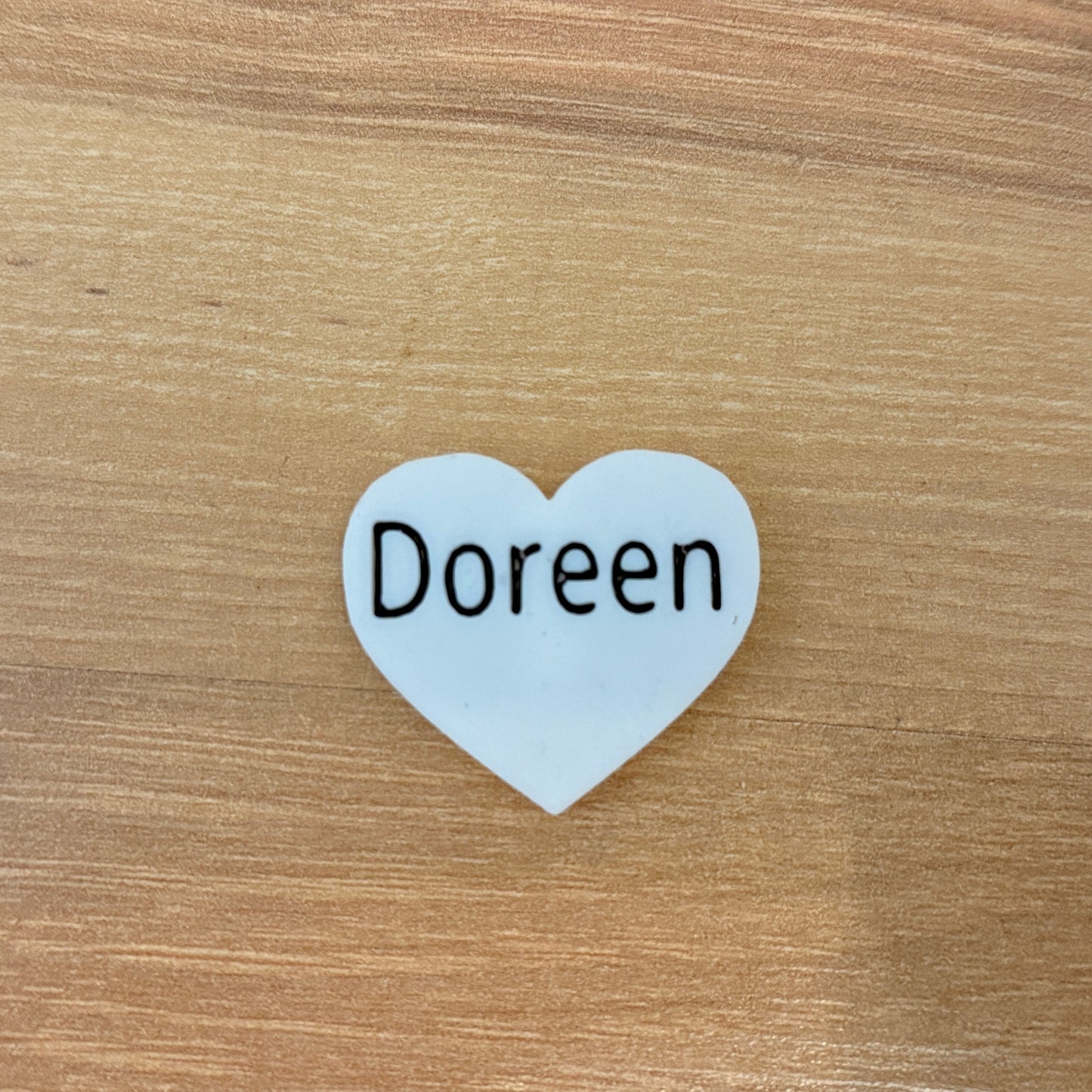 Herzförmiges Namensschild